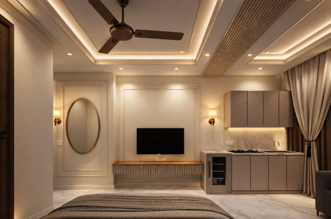 An interior with a framed television wall and kitchenette